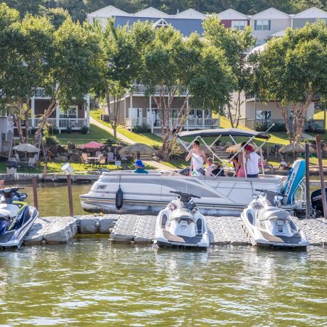 jetskis docked in the lake